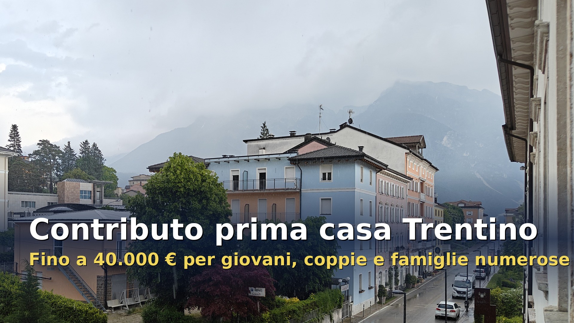Contributo acquisto prima casa Trentino: palazzine residenziali a Levico Terme con le montagne sullo sfondo